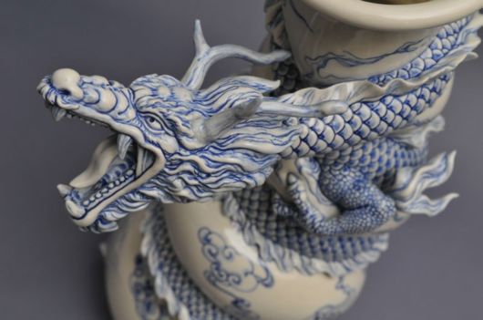 Tsang Sculpts a Dragon Strangling A Porcelain Vase