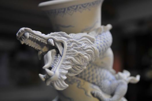Tsang Sculpts a Dragon Strangling A Porcelain Vase