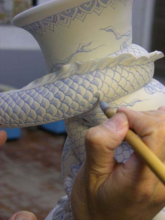 Tsang Sculpts a Dragon Strangling A Porcelain Vase