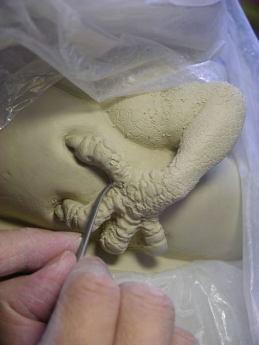 Tsang Sculpts a Dragon Strangling A Porcelain Vase