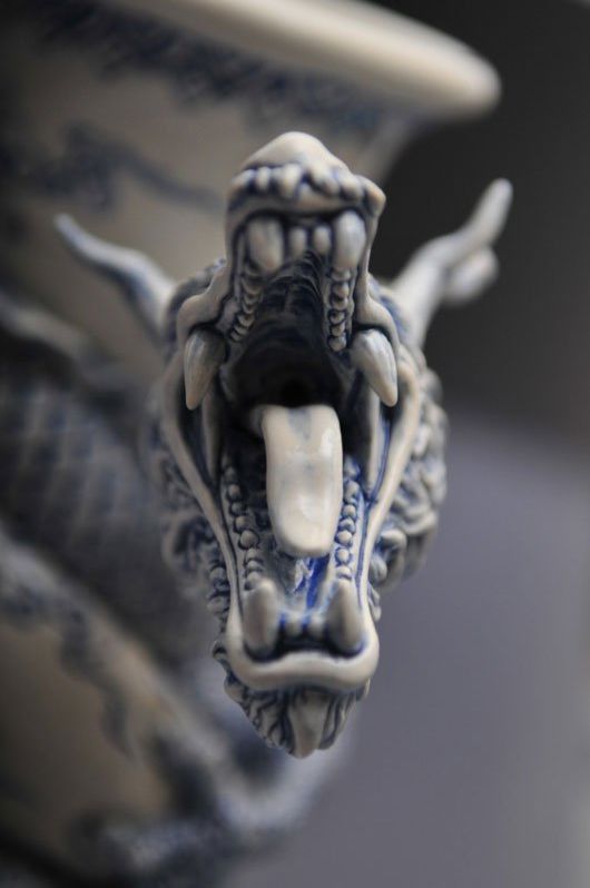 Tsang Sculpts a Dragon Strangling A Porcelain Vase