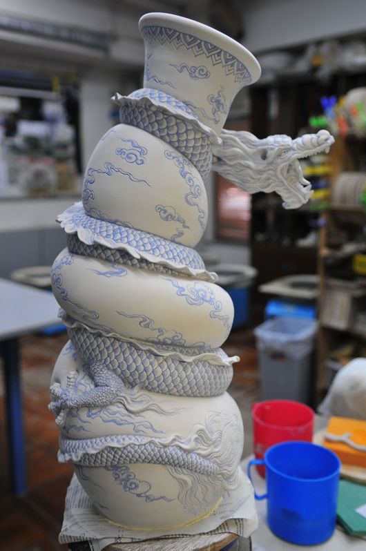 Tsang Sculpts a Dragon Strangling A Porcelain Vase