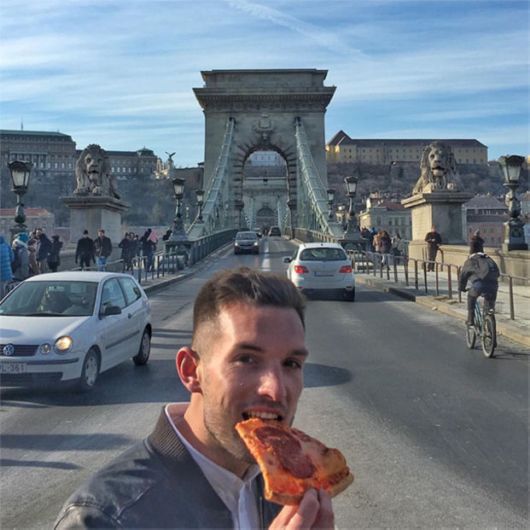 Guy Living His Dream Of Travelling The World And Eating Pizza