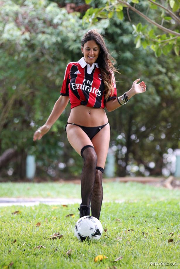 Claudia Romani Playing Football On The Miami Beach
