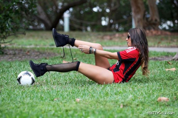 Claudia Romani Playing Football On The Miami Beach