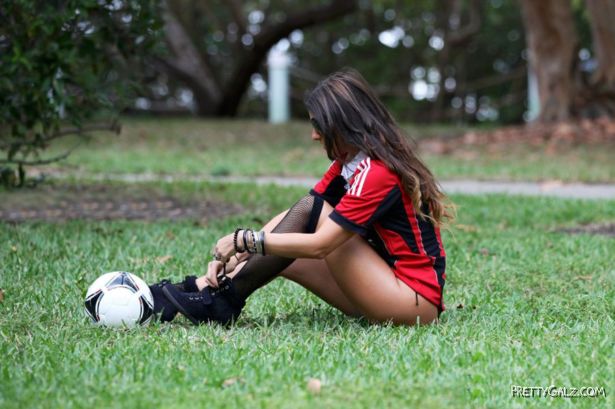 Claudia Romani Playing Football On The Miami Beach