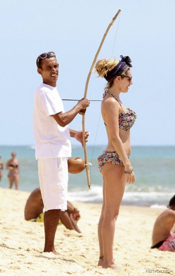 Kelly Brook Having Fun At Beach