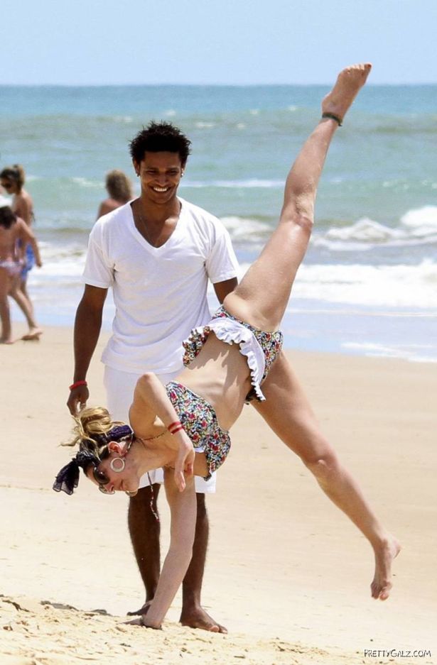 Kelly Brook Having Fun At Beach