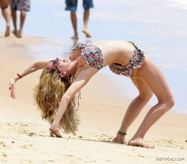Kelly Brook Having Fun At Beach