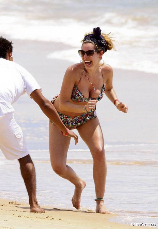Kelly Brook Having Fun At Beach